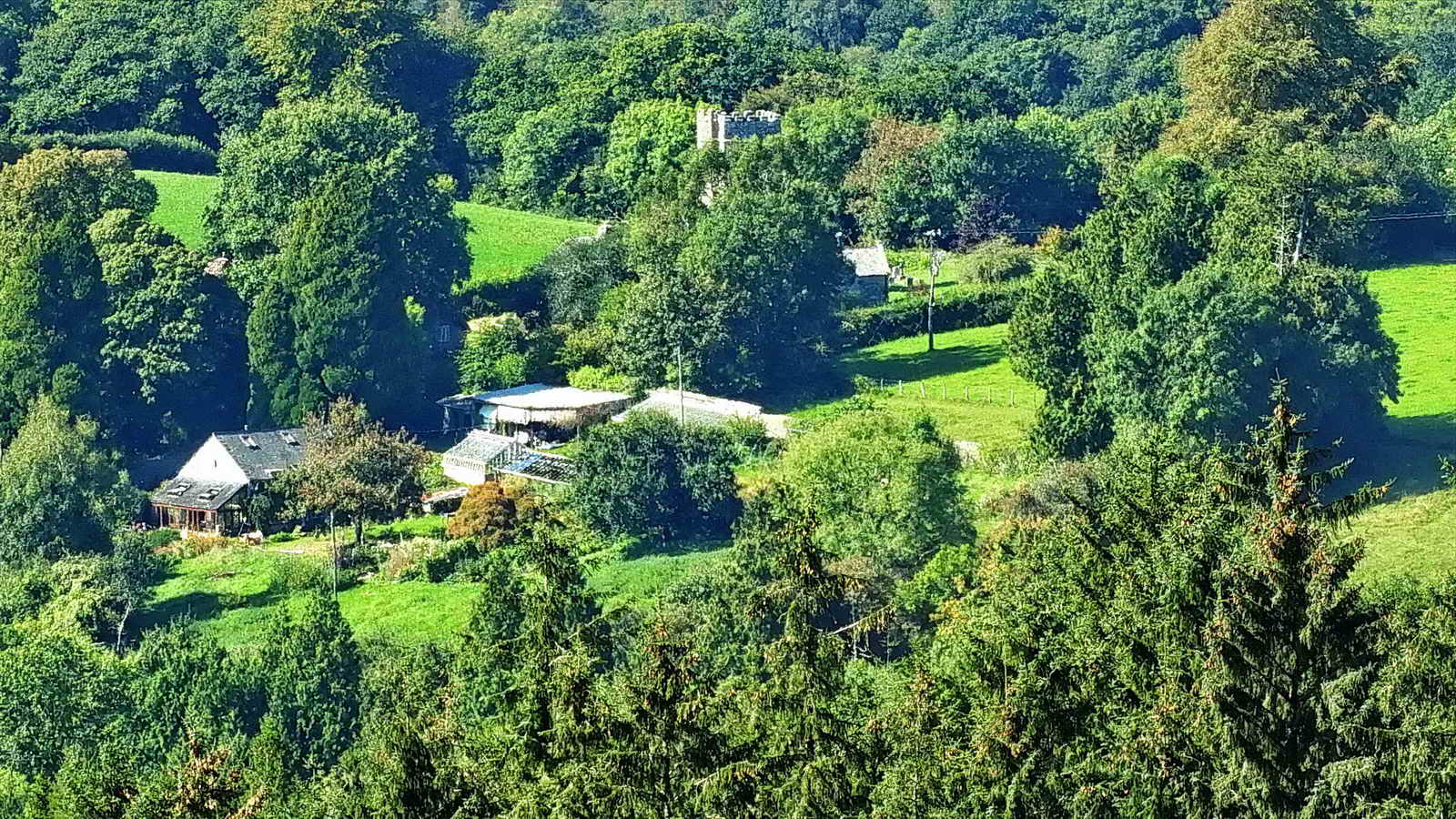 From the Beacon, looking down into Buckland Village and the Church of St Peter with its famous “My Dear Mother” clockface.