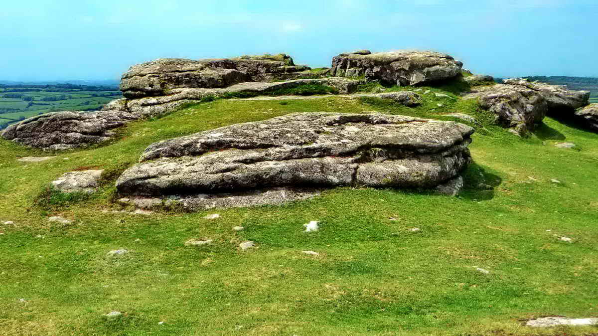 There are more inscriptions on the flat rocks up on the left