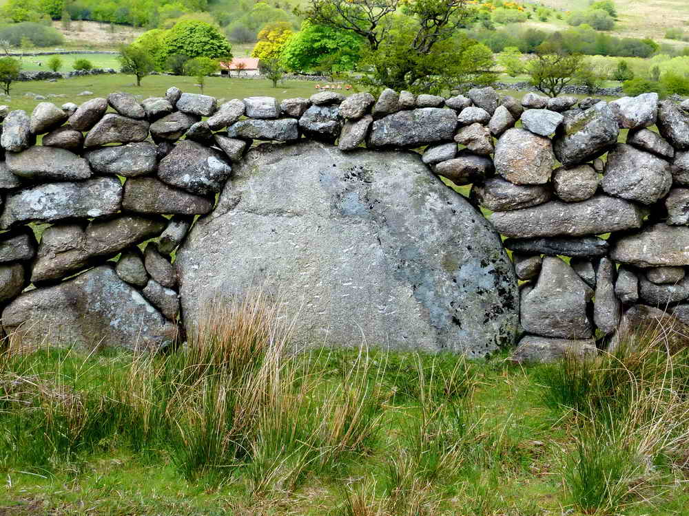 Was it put in position to fit the wall, or was the wall built around it?