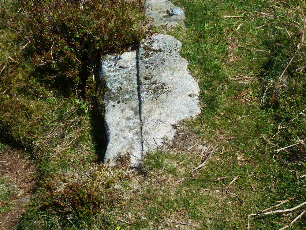 Closer view of a section of granite rail clearly showing where the metal shod wheels of the tram ran