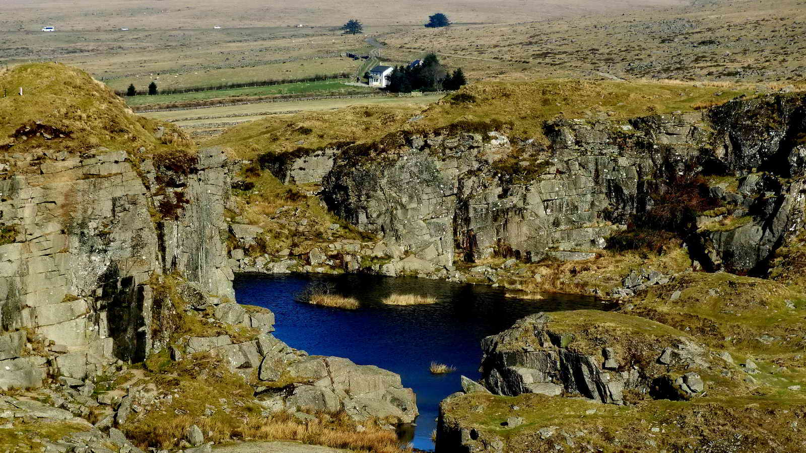 Looking back across the quarry to Yellowmeade Farm