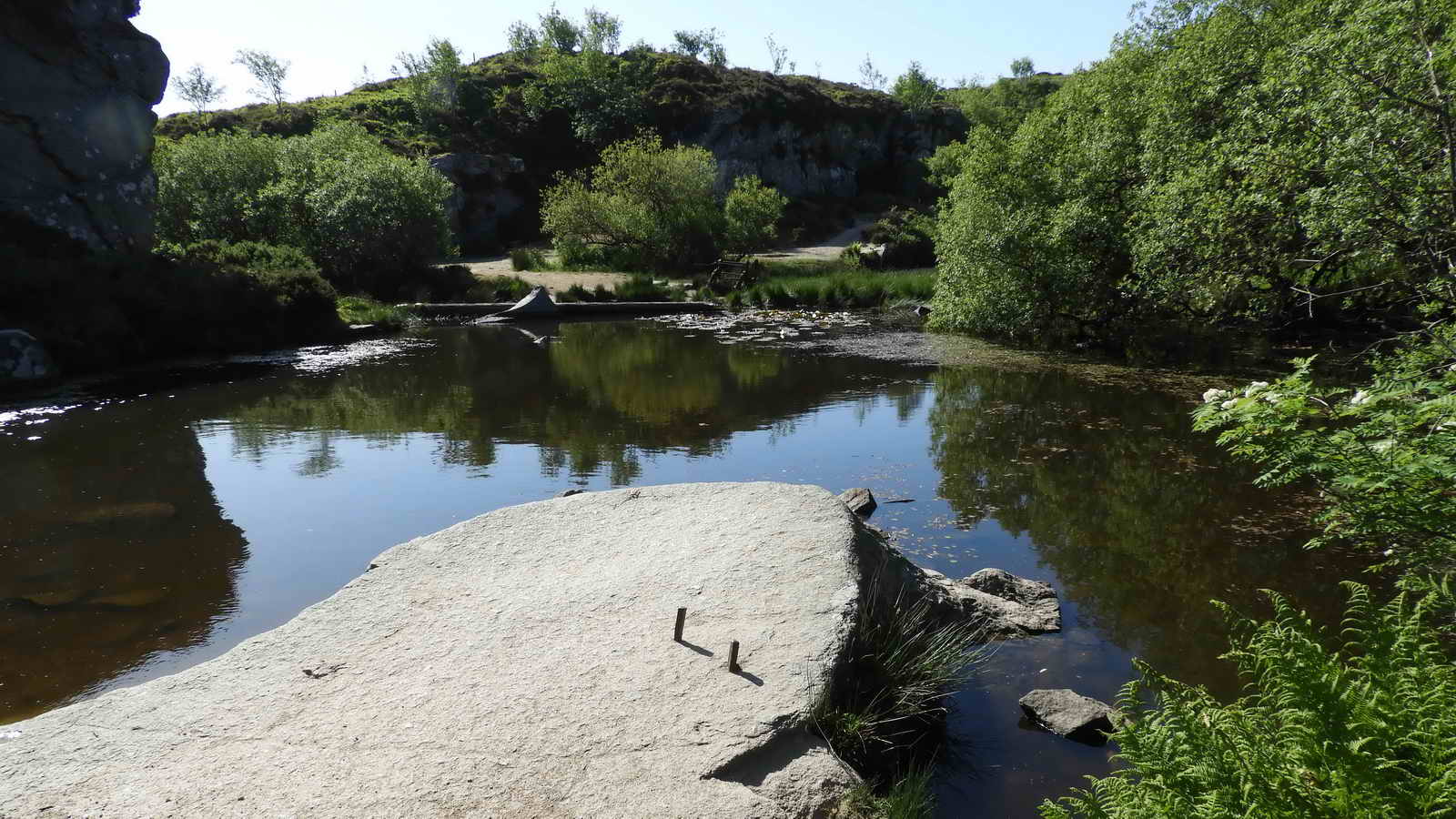 View back across the middle pond. Note the two iron spikes left in the rock - seemingly to trip the unwary