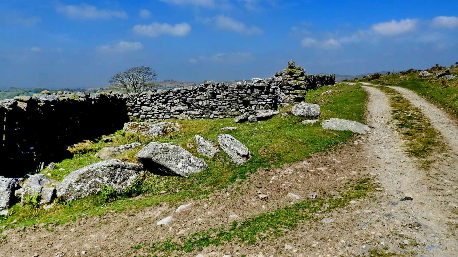 Some of the ruins of Babyland - this was possibly the site of a smithy. Central in the wall ahead is an inscribed stone showing “IW”