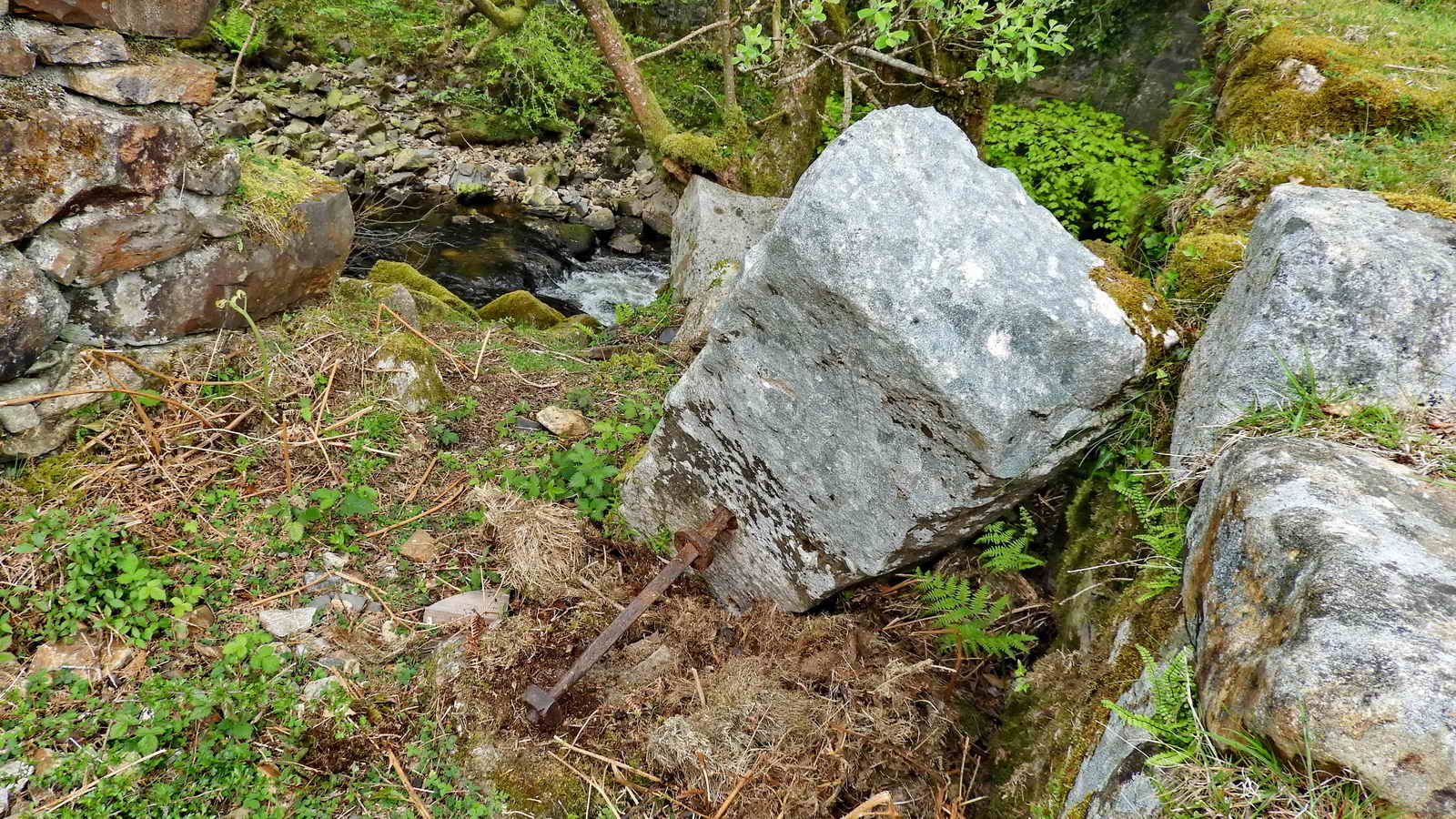 Another worked stone in the wheelpit. It has a square sectioned iron strut embedded in it with a large nut and washer still attached