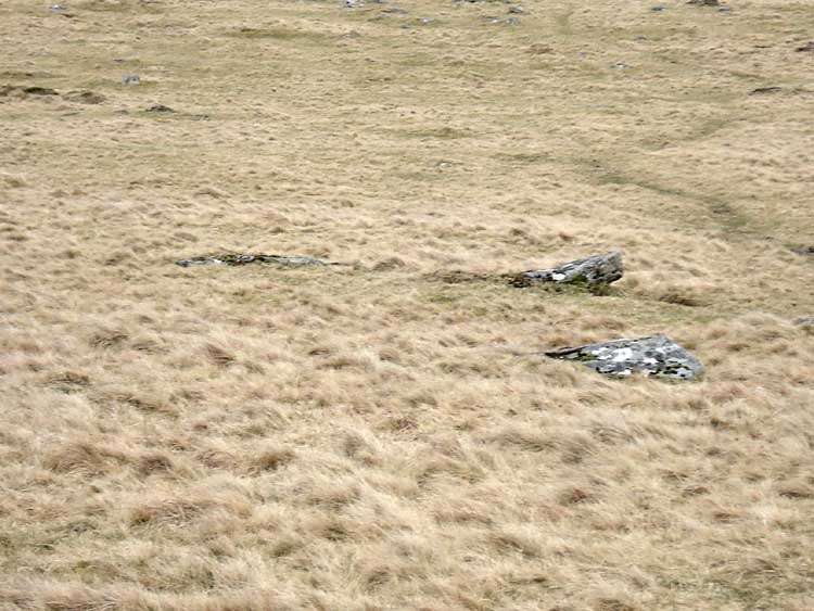 A collapsed stone circle nearby