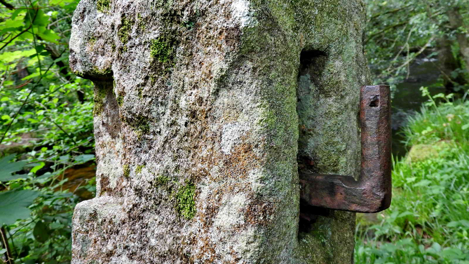 Slotted gatepost re-used as a hanging gatepost