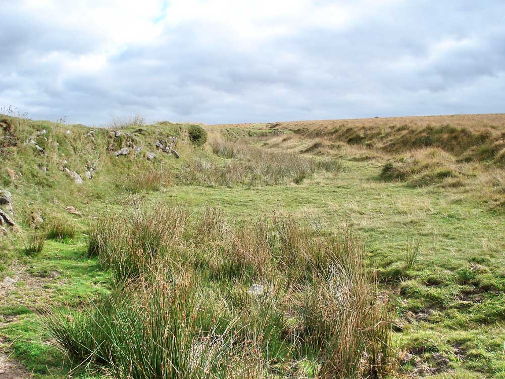 Looking up towards Eyelesbarrow along the old corn ditch wall