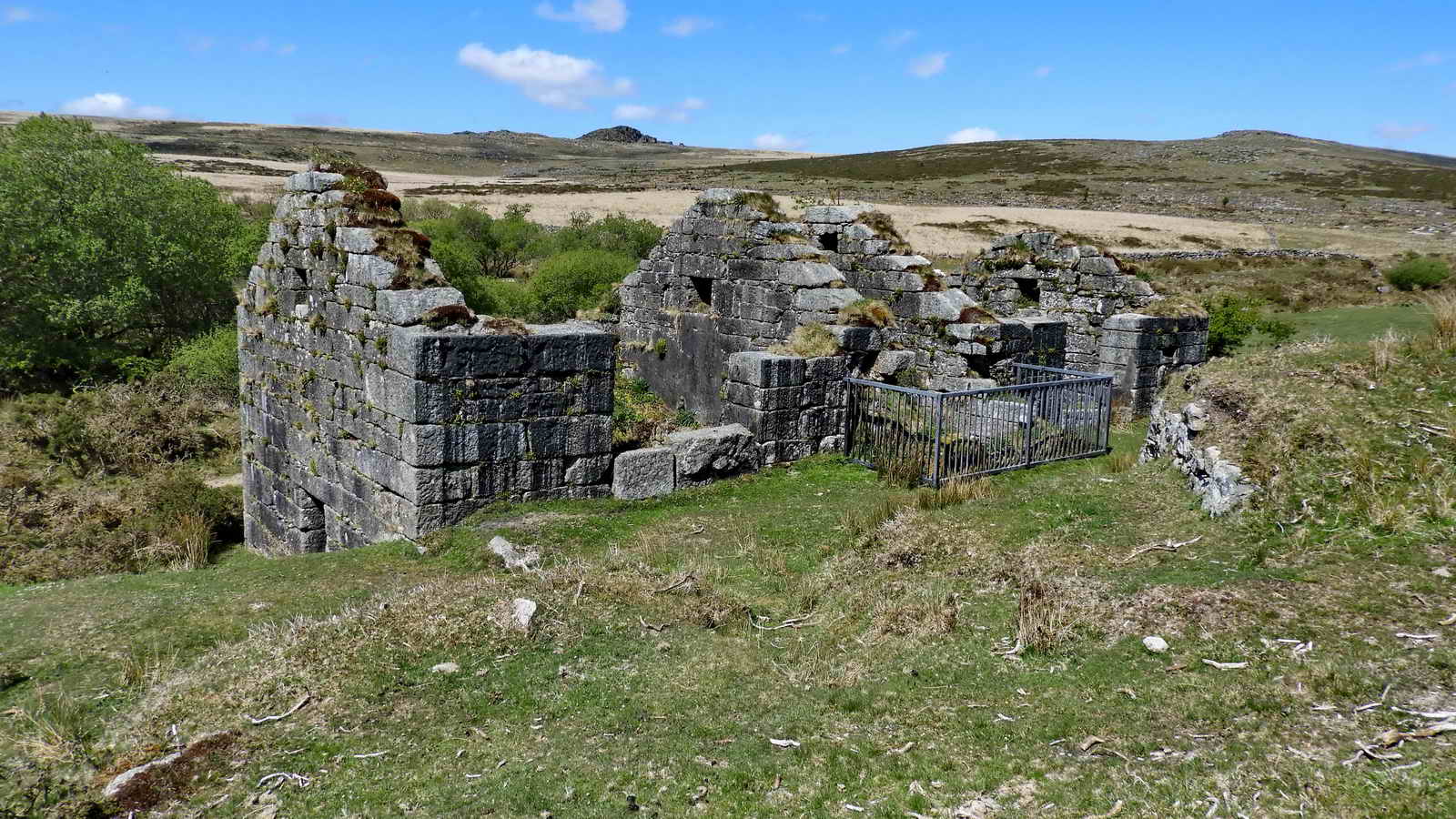 From the “rear” - this is the third incorporating mill in the system in that the water comes from the mills above here on the hill. The raised bank bringing the water to a launder to reach the water wheel is seen at the right 