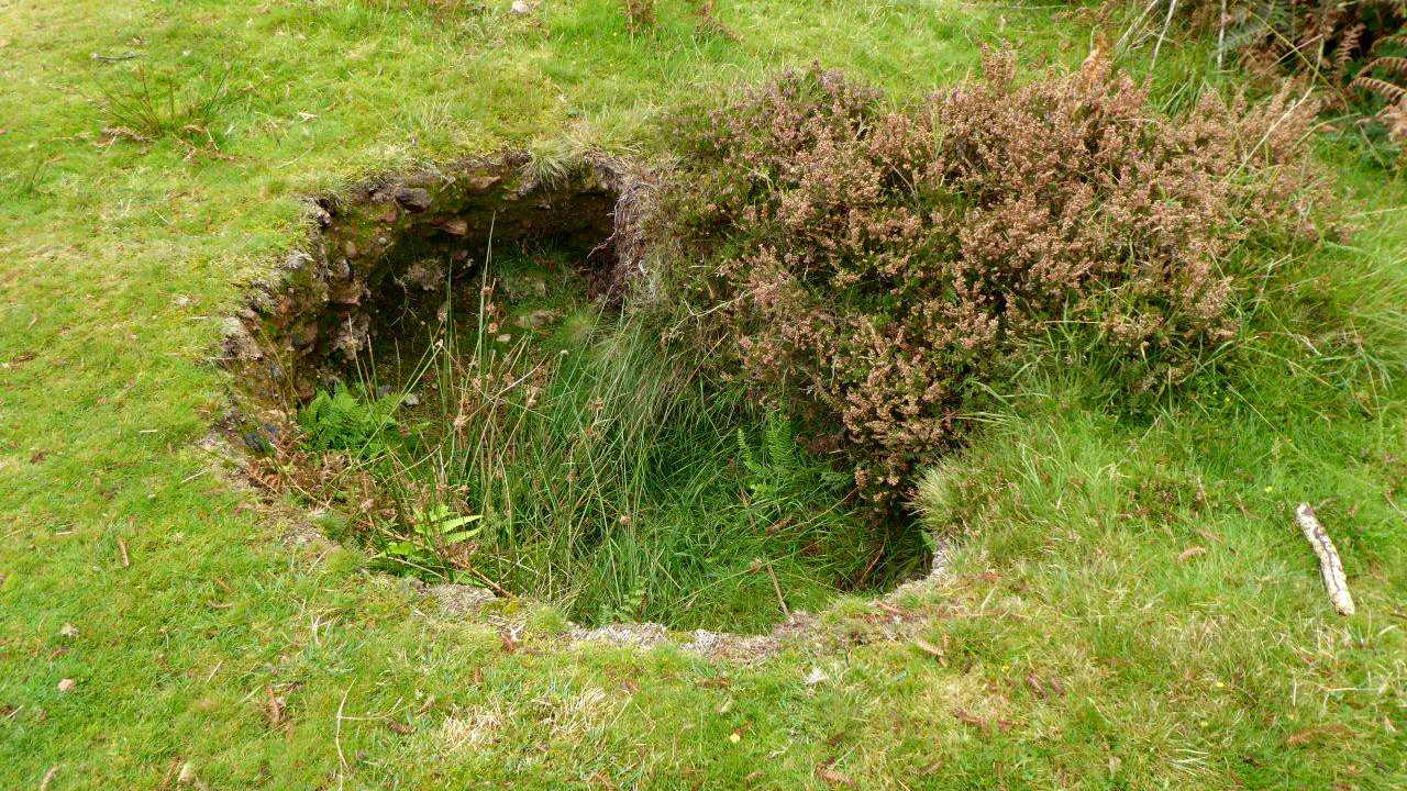 A sinkhole beside the track, indicating collapsed workings underneath from the mining activity