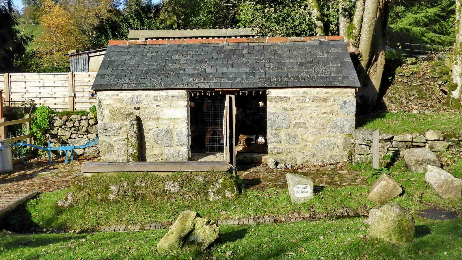 Below the well is the Old Pig and Heritage Garden